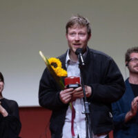 Filme sobre os relojoeiros anarquistas da Suíça leva grande prêmio na Coreia